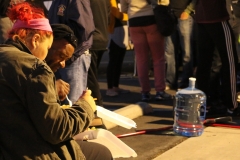 A homeless couple eat a free meal from the Streets of Hope San Diego this Easter.