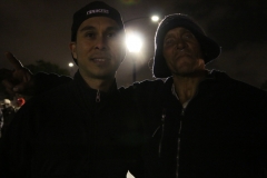 Carlos and a homeless man arm over arm at our Easter event.
