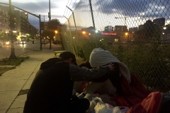 Nate prays for a homeless man in downtown San Diego.