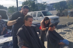 Tammy and Eric cut two homeless men's hair in downtown San Diego.
