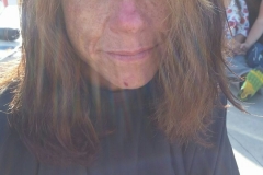 AFTER: A homeless woman after her hair cut.