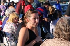 Anne listens intently to a homeless woman tell her story.