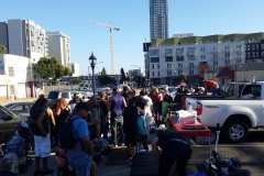 The homeless getting clothing donations and other services.