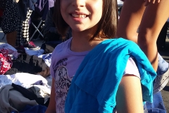 Angel is all smiles after getting her hair cut downtown on the Streets of San Diego.