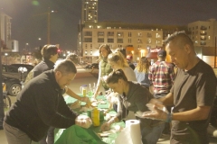 Proper food handling while making sandwiches for San Diego's homelesss.