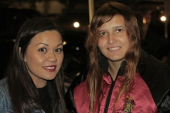 Tammy and a homeless girl smile after Tammy cuts her hair.