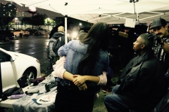 Homeless girl Angel gives Tammy a big hug after cutting her hair.