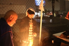 Carlos manages the grill for our homeless Thanksgiving event.