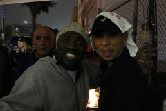 Conrad and Carols, Streets of Hope volunteers, all smiles while feeding the homeless at our Thanksgiving event.