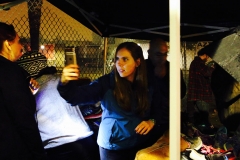 Jenn takes a photo at our Thanksgiving homeless event.
