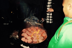Hamburgers are cooking for our homeless event downtown San Diego.