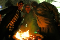The food is cooking up nicely on the grill at our homeless event downtown.