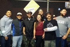 Tammy and the amazing barbers of the Country Club Barber Shop after cutting the hair of the homeless on Christmas.