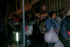 Over 150 homeless people line up for a hot Christmas meal in downtown San Diego.