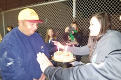 Tammy presents Dave, our homeless friend, with a birthday cake at our Christmas event.