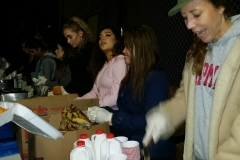Feeding the homeless at the Streets of Hope San Diego Christmas event.