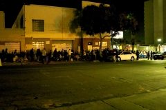 A view from across the street at our Christmas event as the homeless line up for a hot meal.