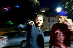 Denis points out the chiropractor area to a homeless man about to receive an adjustment.