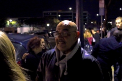 Our homeless friend Alex talks with Jenn at our homeless Christmas event.