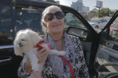 Diane and Gizelle help unload a car full of supplies for the homeless in downtown San Diego.