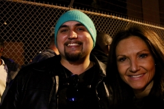 Streets of Hope volunteers Dante and Teresa smile while serving San Diego's homeless.