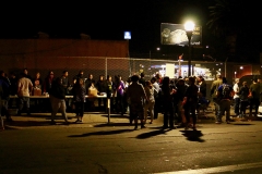 Thanksgiving food line for the homeless begins to form.