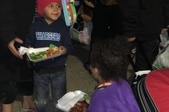 Homeless kids eat a hot meal at our Christmas event.