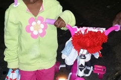 Homeless girl Christiana got a bike as her Christmas gift -she took so many photos she was tire of posing.