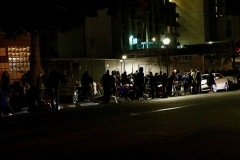Wide angle shot of serving the homeless downtown right on the streets of San Diego.