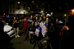 Homeless Christmas Downtown Volunteers hold up all the gifts we are about to give homeless children