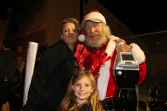 Rebecca, Santa and Aryana serving the homeless on Christmas