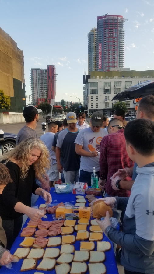 Making sandwiches for the homeless on the streets of San Diego