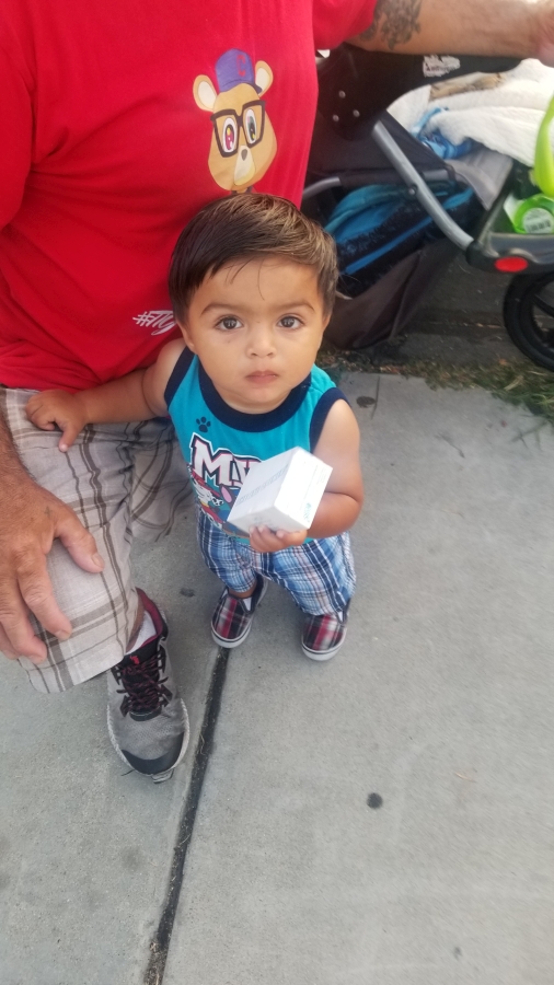 Little Antonio loved holding a bar of soap donated by Newport Pacific.