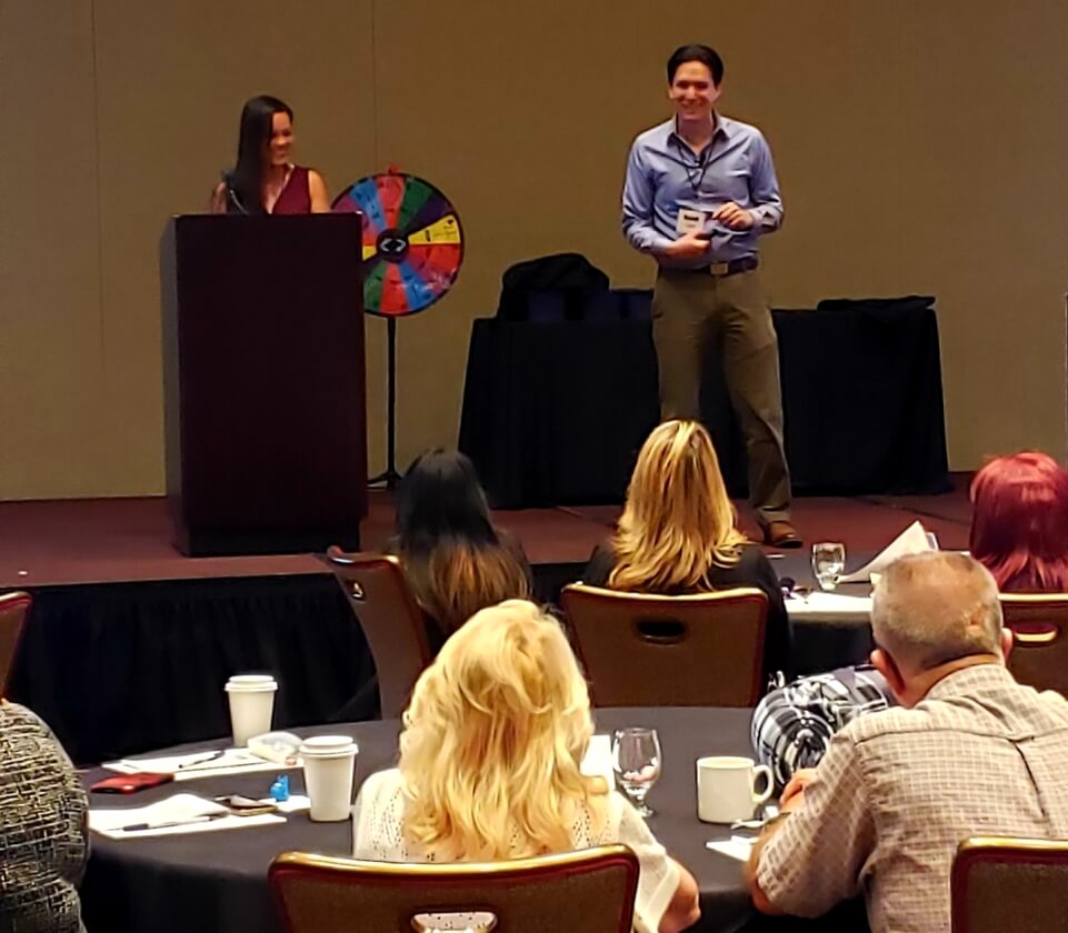 Tammy and Dan answer questions from the Newport Pacific staff after their San Diego homeless presentation.