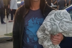 A San Diego homeless man receives a blanket.