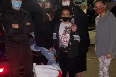 Monday night before Christmas passing out items donated by Sharp Mesa Vista staff