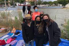 SDSU's Helping the Homeless passing out clothes to the homeless downtown
