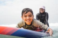 Streets of Hope Kids Surf lessons learning to surf