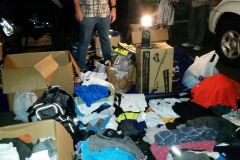 Clothing and other donations pile up for San Diego's homeless at our Thanksgiving 2015 event.