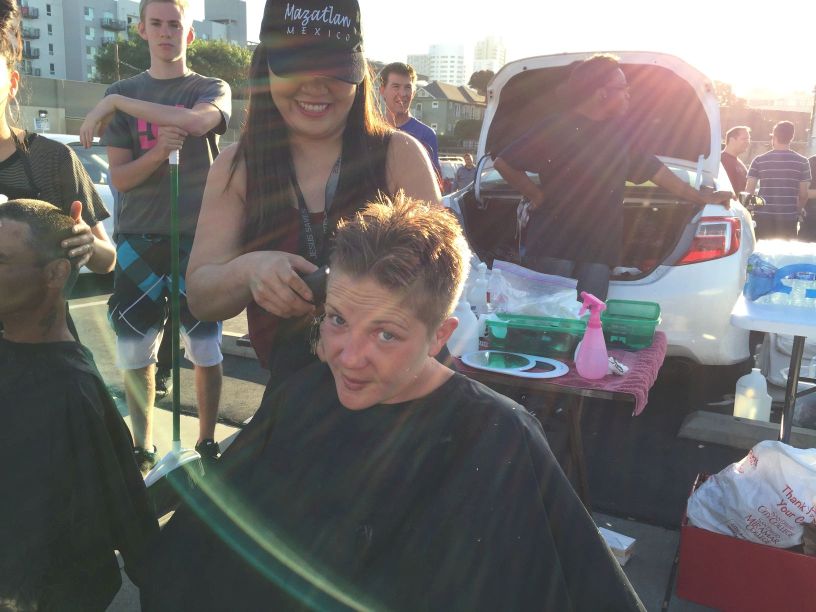Sun Lines Paint The Smile Of A Homeless Women Getting Her Hair Cut