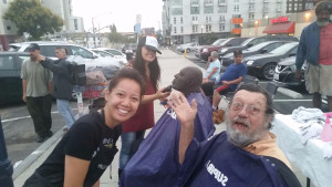 All smiles cutting the hair of San Diego's homeless
