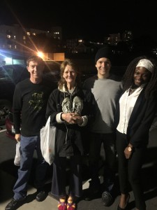 Parker, Dan and Charlene with Lisa, a homeless woman who got new sneakers!