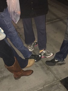 Homeless women shoes off her new sneakers as we all join in!