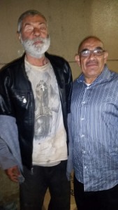 Homeless man Stephen missing one eye with Streets of Hope San Diego volunteer Alex.