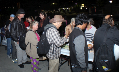 The homeless food line is really moving as people are getting feed. -  Streets Of Hope San Diego