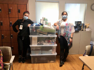 Heather and Jessica, Co-Chairs, with all the donations gathered by Sharp Mesa Vista Hospital staff.