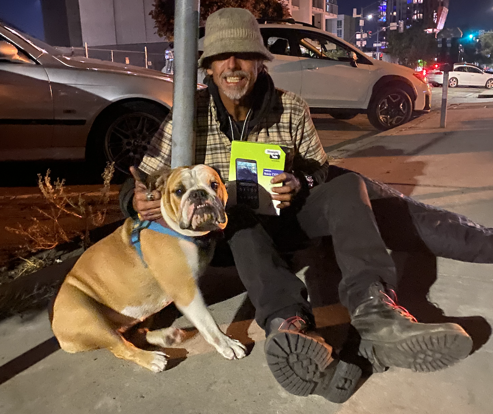 Streets of Hope San Diego gives Homeless man phone to apply for jobs