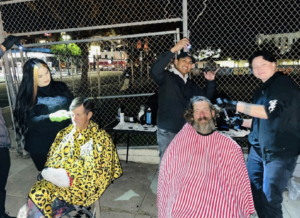 Homeless friends receive Christmas haircuts