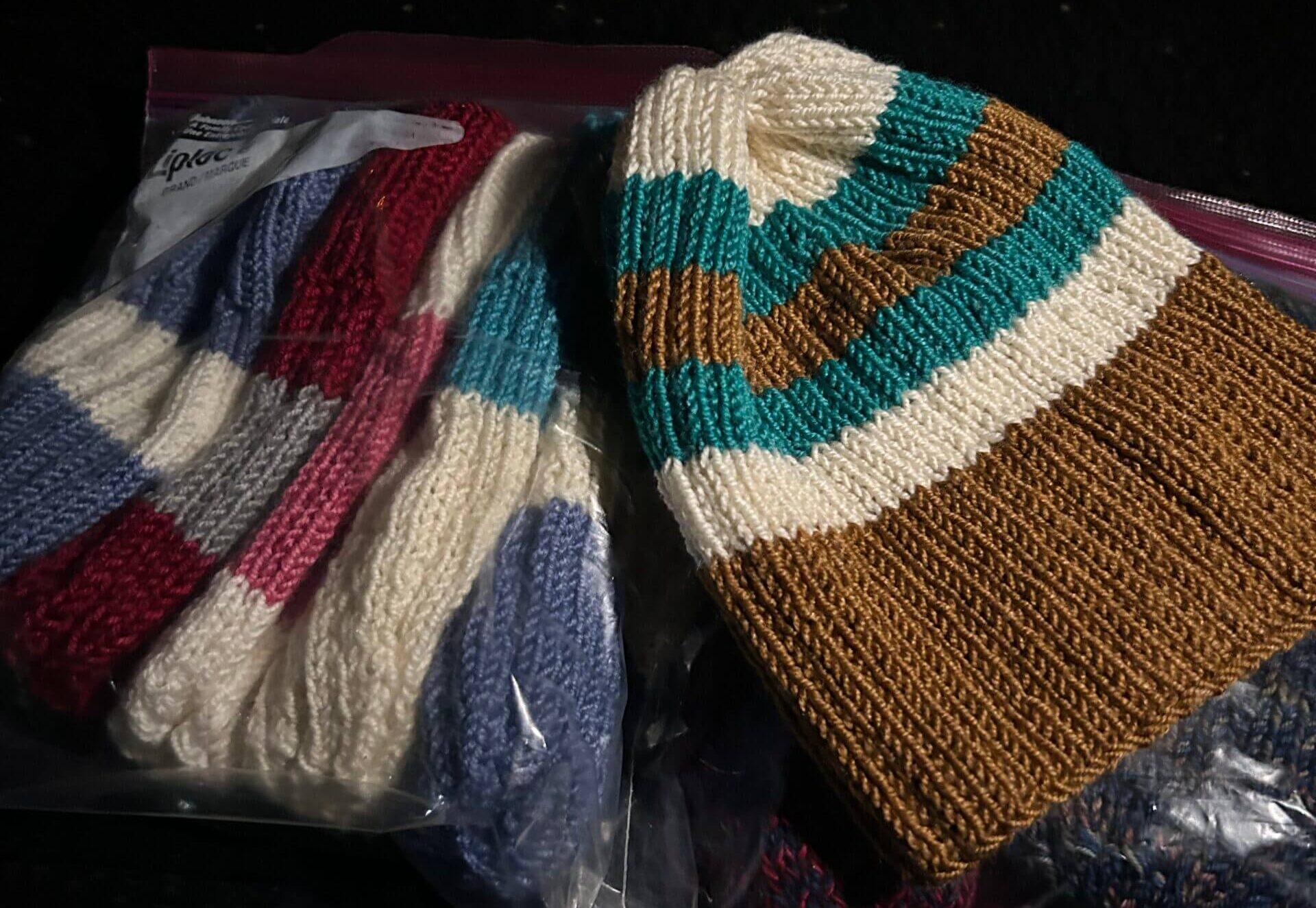 Streets of Hope Volunteer Donates Hand Knitted Hats